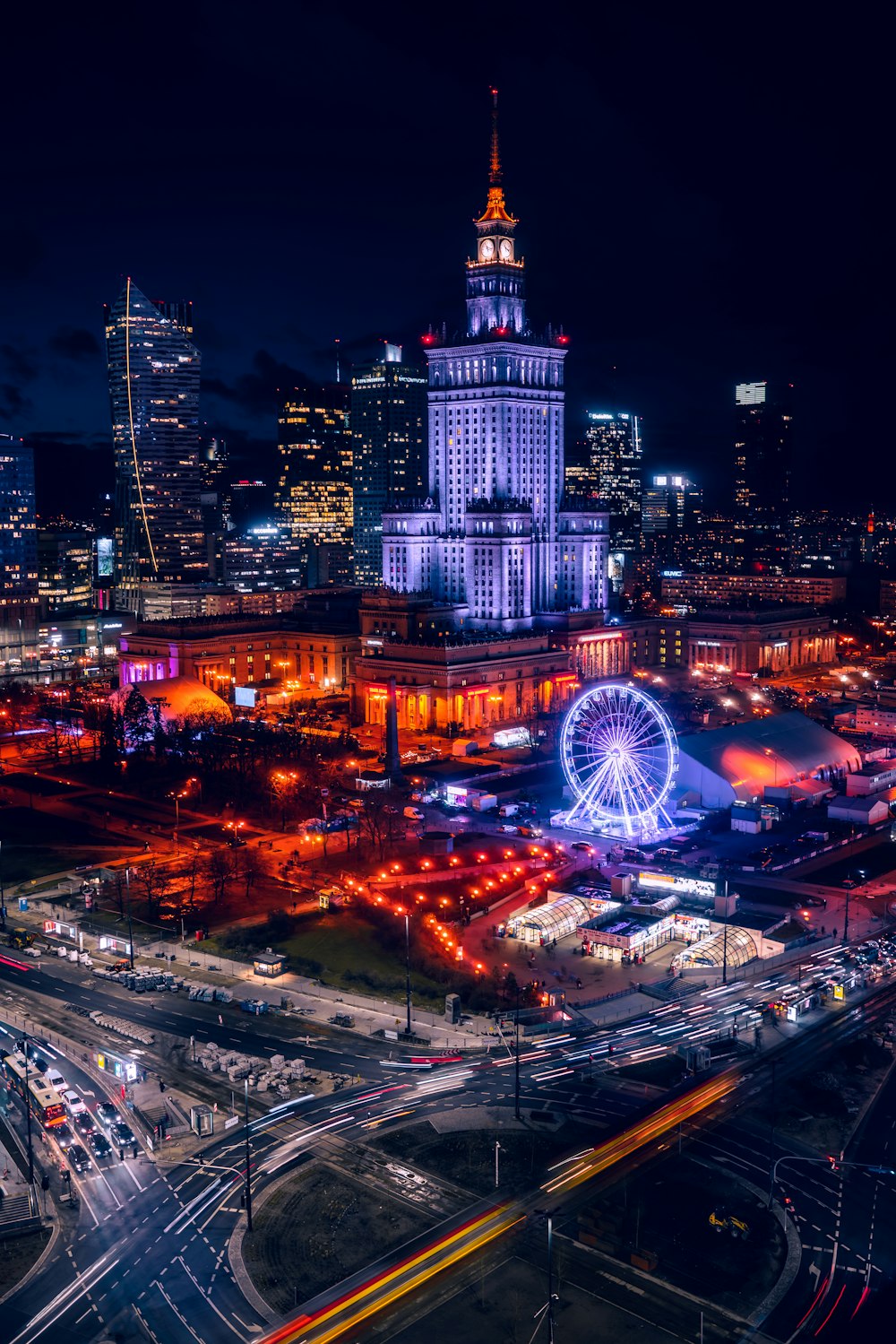 an aerial view of a city at night