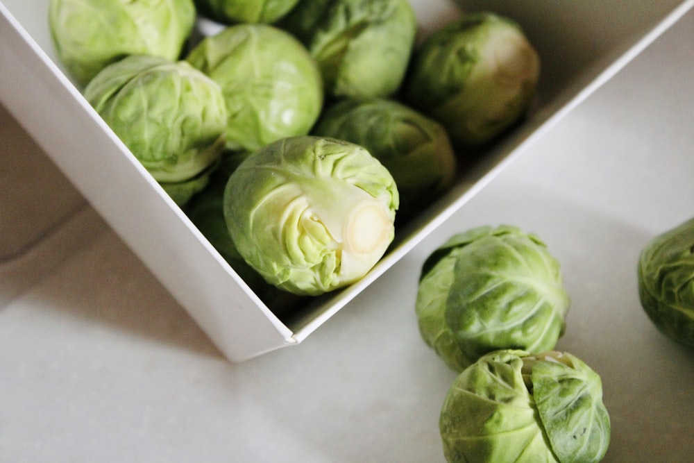 a box of brussels sprouts on a table