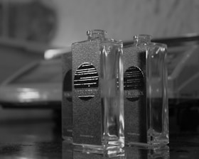 a couple of bottles sitting on top of a table