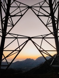 a view of the mountains from a high tower