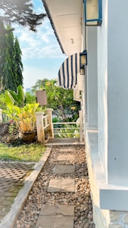 A serene garden path leading to a nursing home.