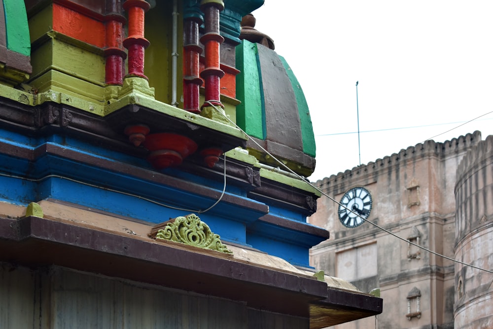 a building with a clock on the side of it