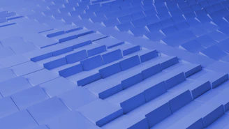 A waterproof shower curtain featuring a subtle geometric pattern in calming blue tones.