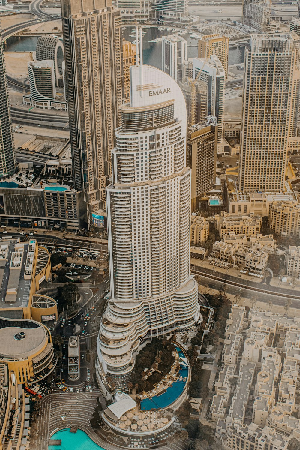 an aerial view of a city with tall buildings