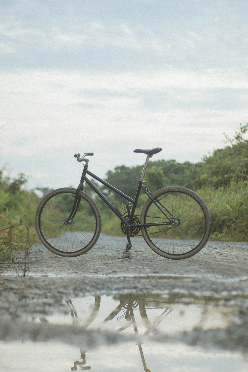 a bike is parked on the side of the road