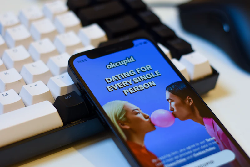 phone beside a keyboard for discreet online dating