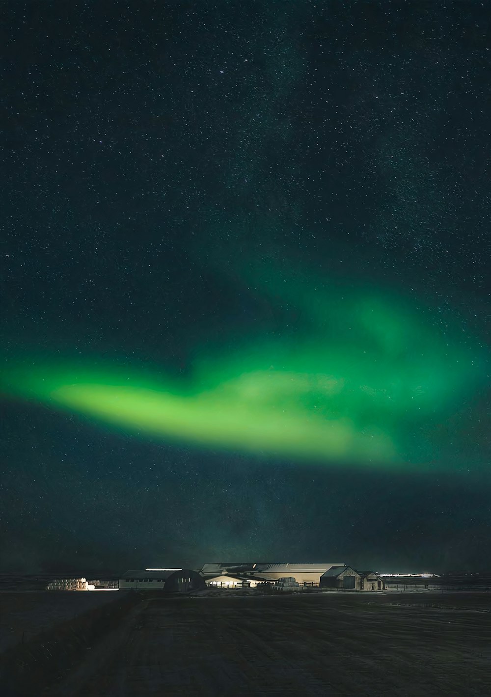 a green aurora bore in the night sky