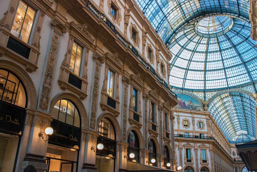 the inside of a building with a glass ceiling