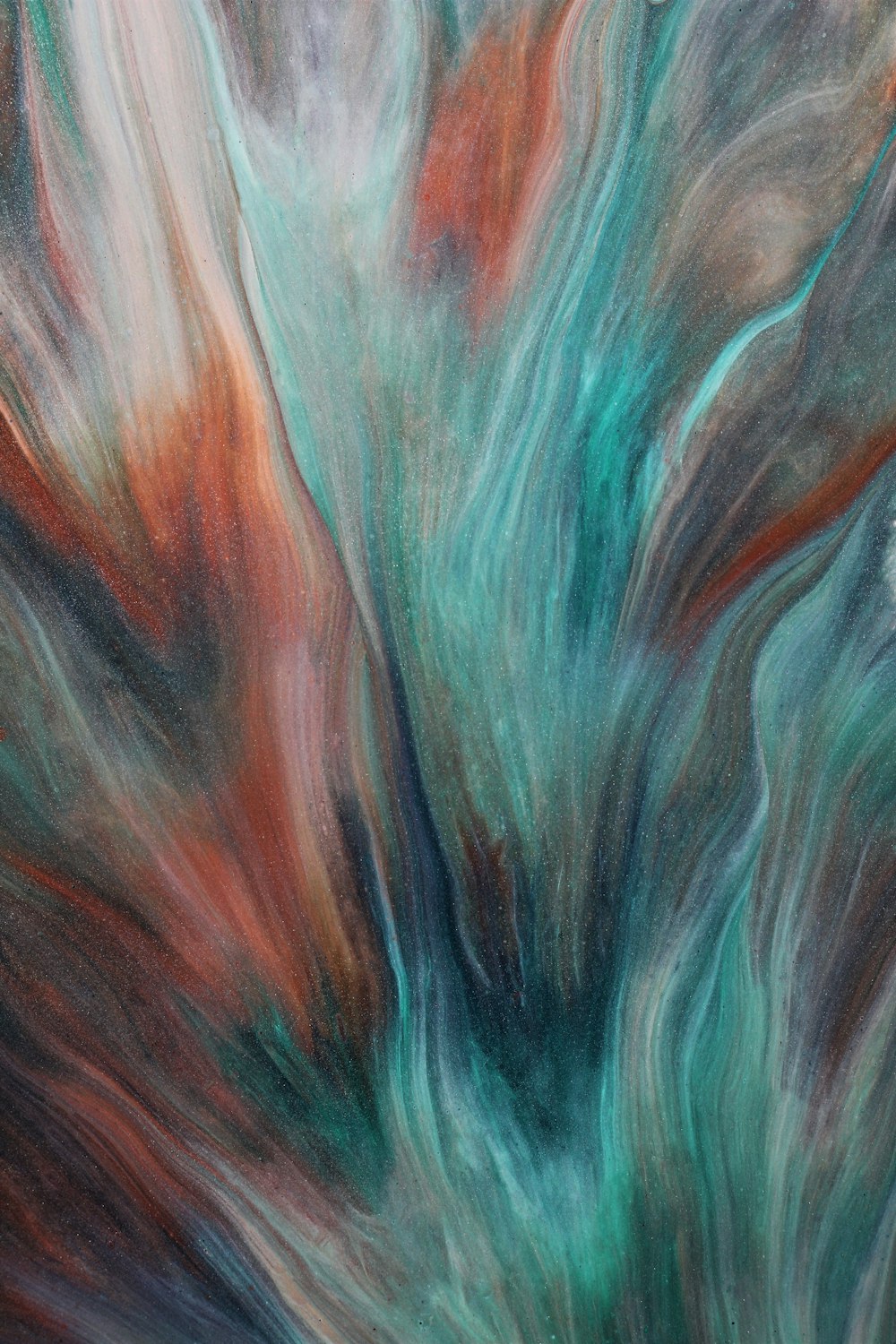 a close up of an abstract painting with colors