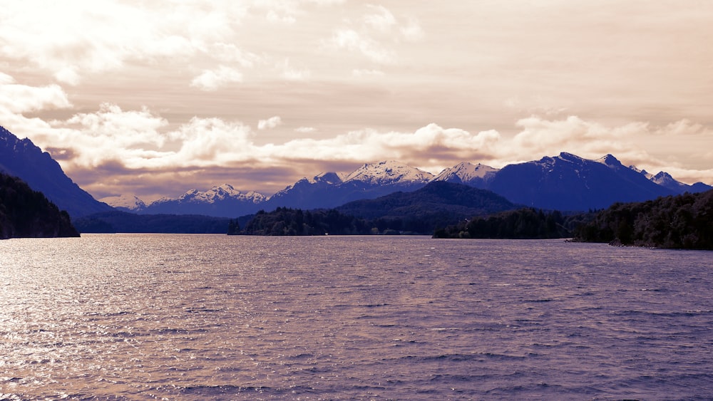 a large body of water surrounded by mountains