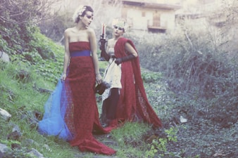 a couple of women standing next to each other