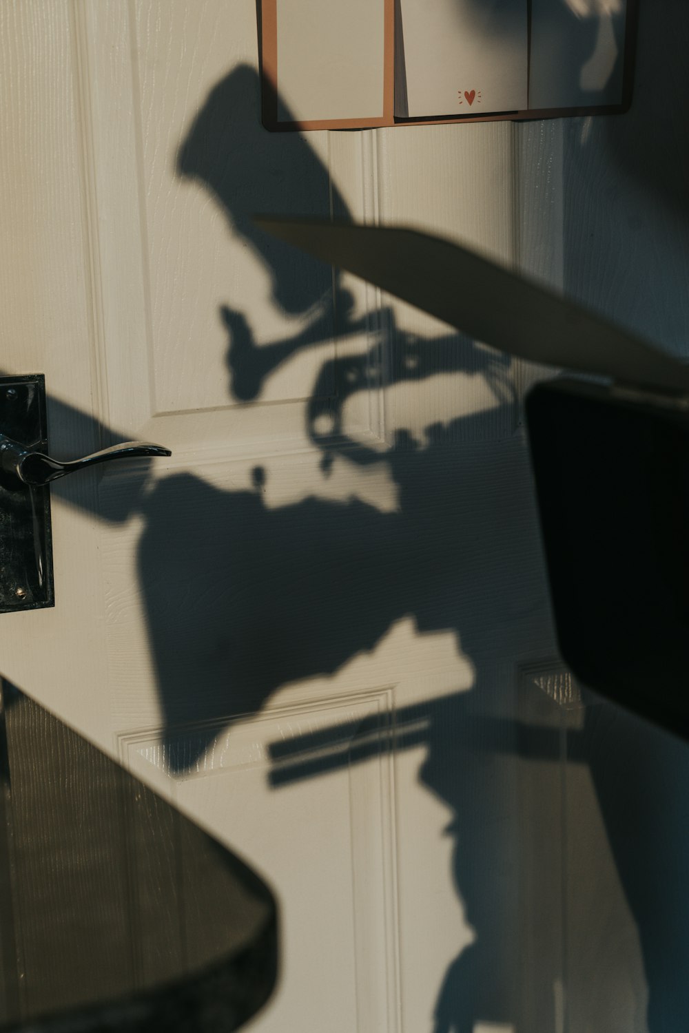 a shadow of a person on a wall