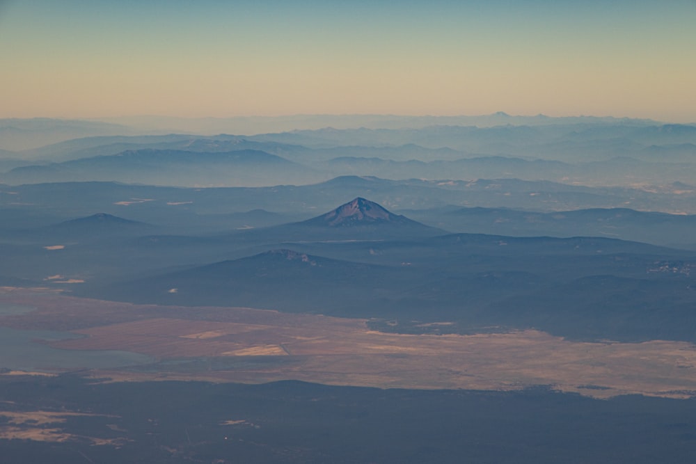 a view of a mountain range from an airplane