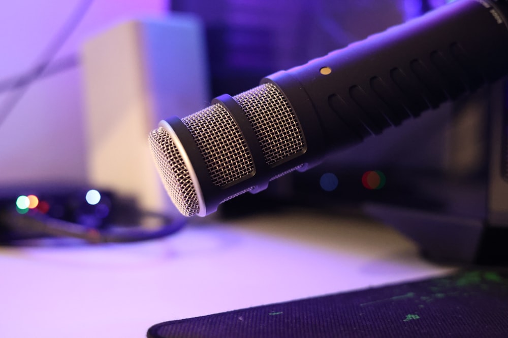 a close up of a microphone on a desk