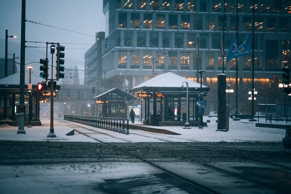 a train station in the middle of a snowy day