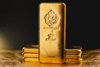 Secure armored truck transporting gold bars under escort.