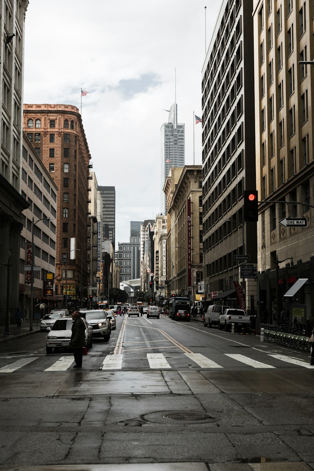 a city street filled with lots of tall buildings