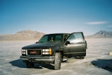 A GMC truck parked in a scenic outdoor setting, ready for its new owner’s adventures.