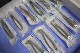 a table topped with lots of surgical tools