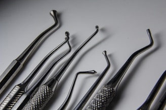 a group of dental tools sitting on top of a table