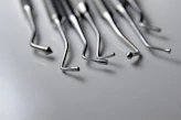 a close up of a bunch of metal nails