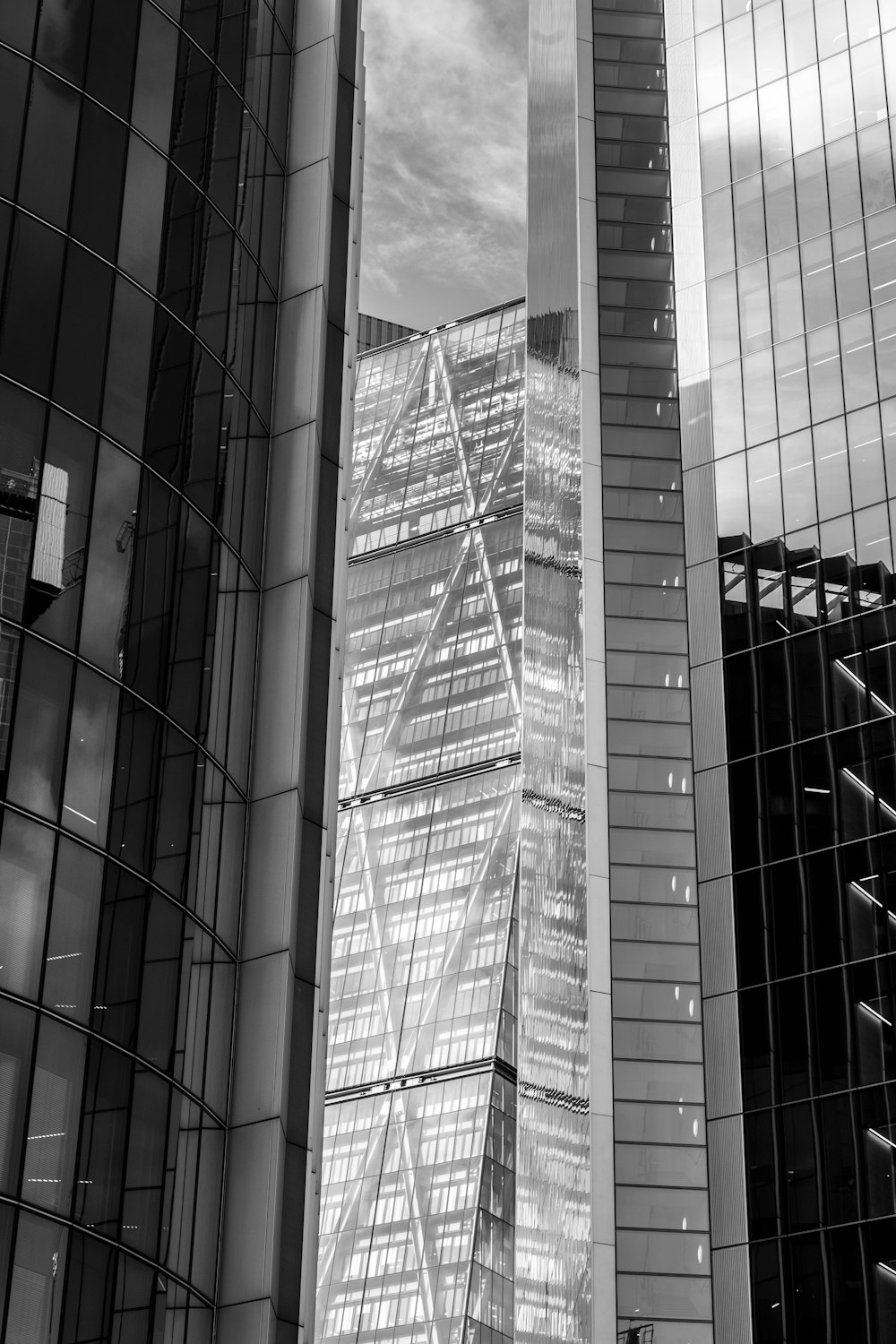 a black and white photo of a skyscraper