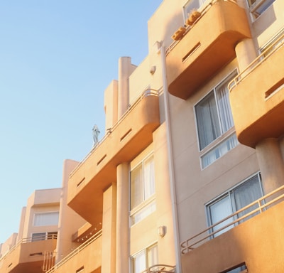 an apartment building with balconies and balconies on the balconies