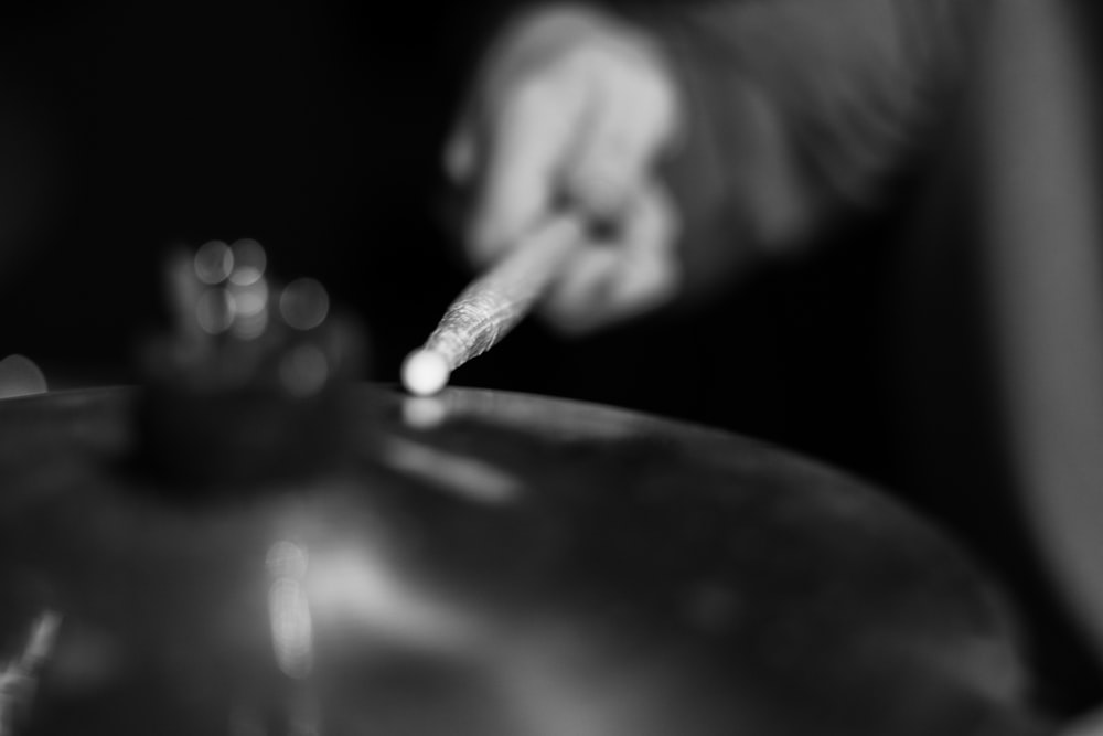 a close up of a person playing a musical instrument