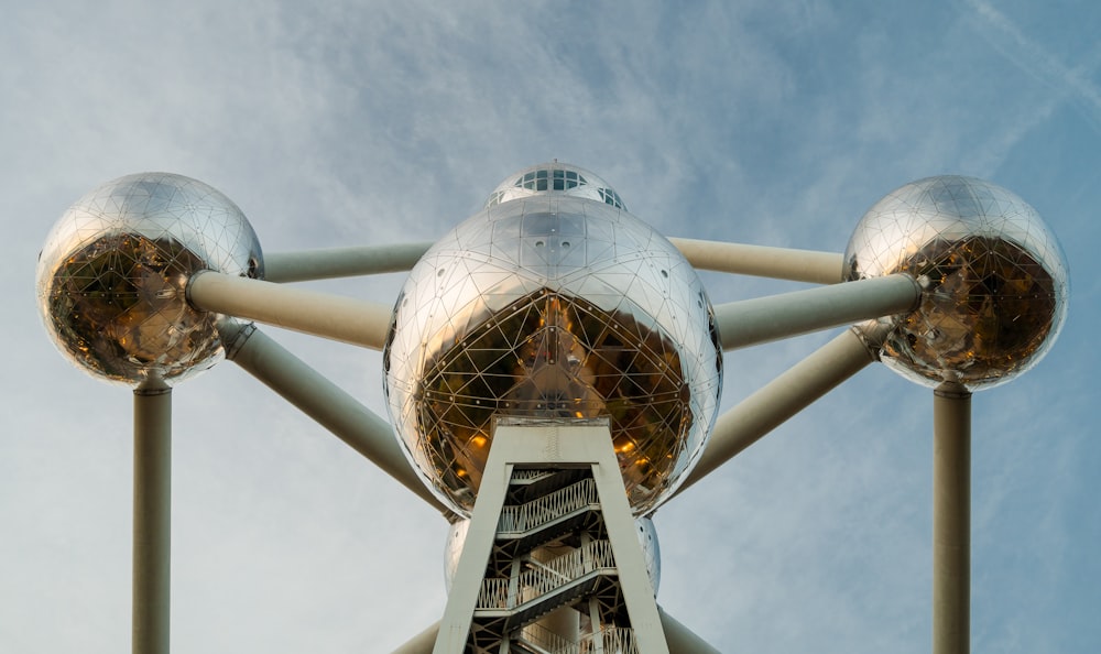 a large metal structure with a lot of mirrors on it