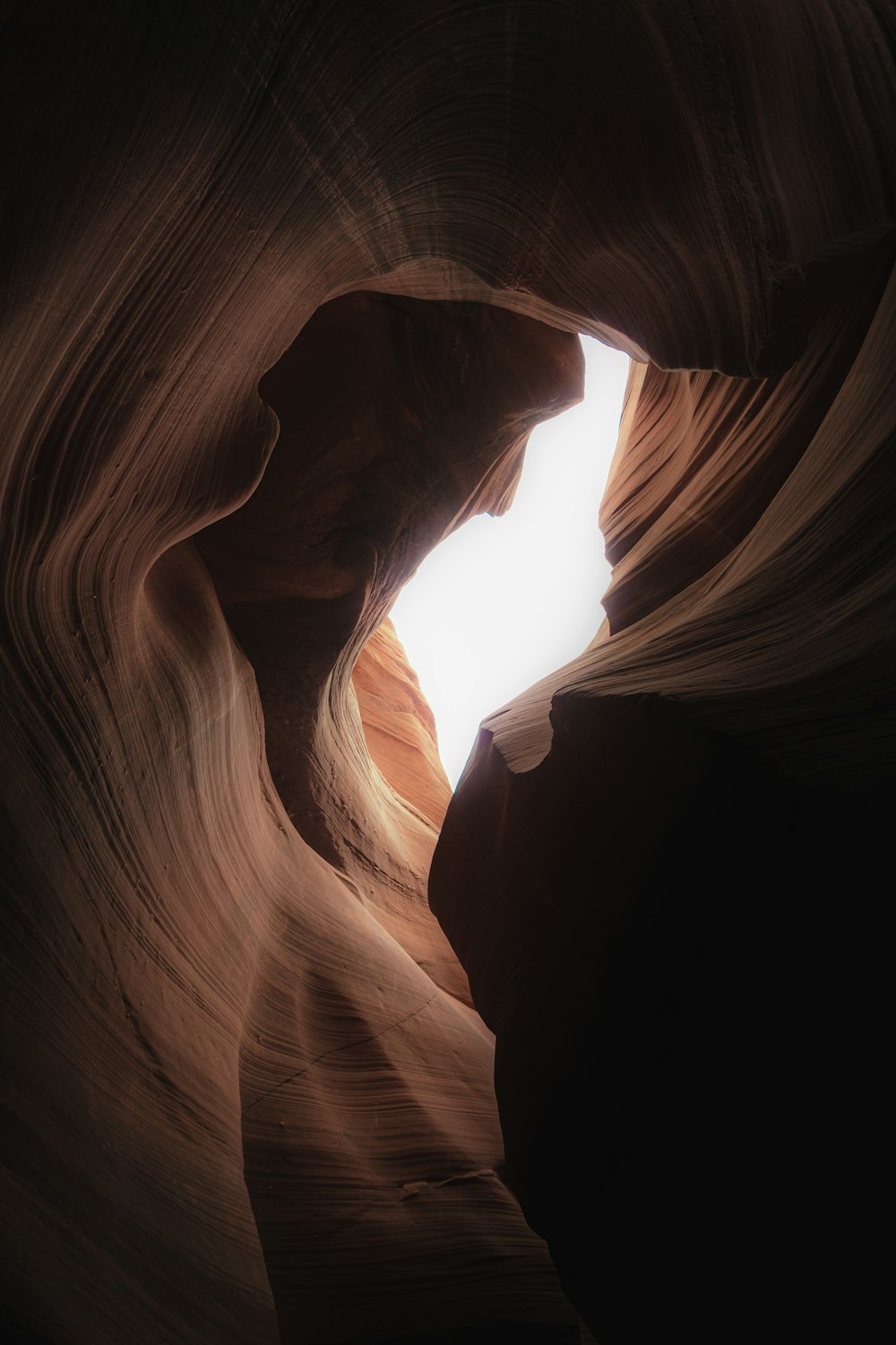 a narrow slot in the side of a canyon