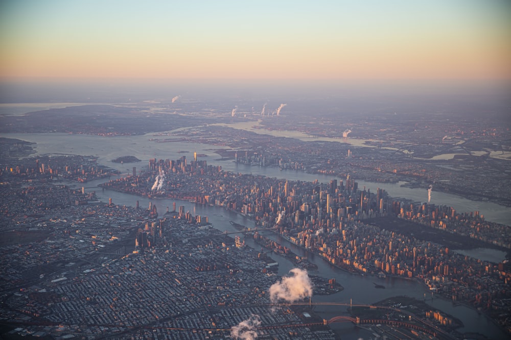 an aerial view of a city and a river