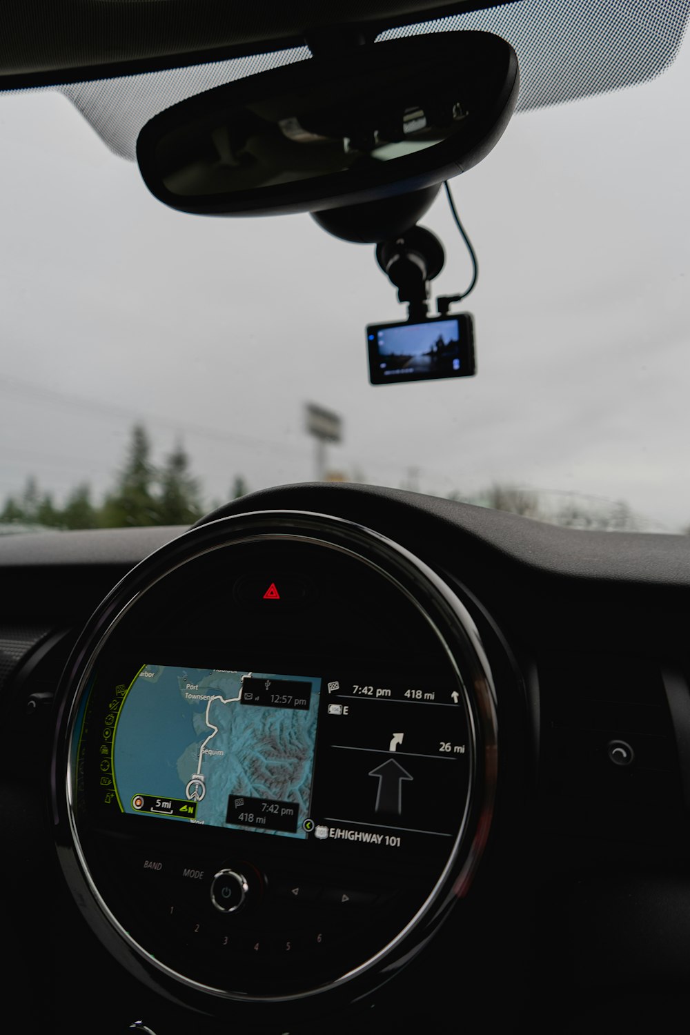 the dashboard of a car with a gps device