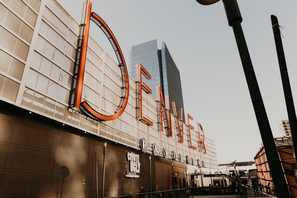 a tall building with a giant sign on it's side