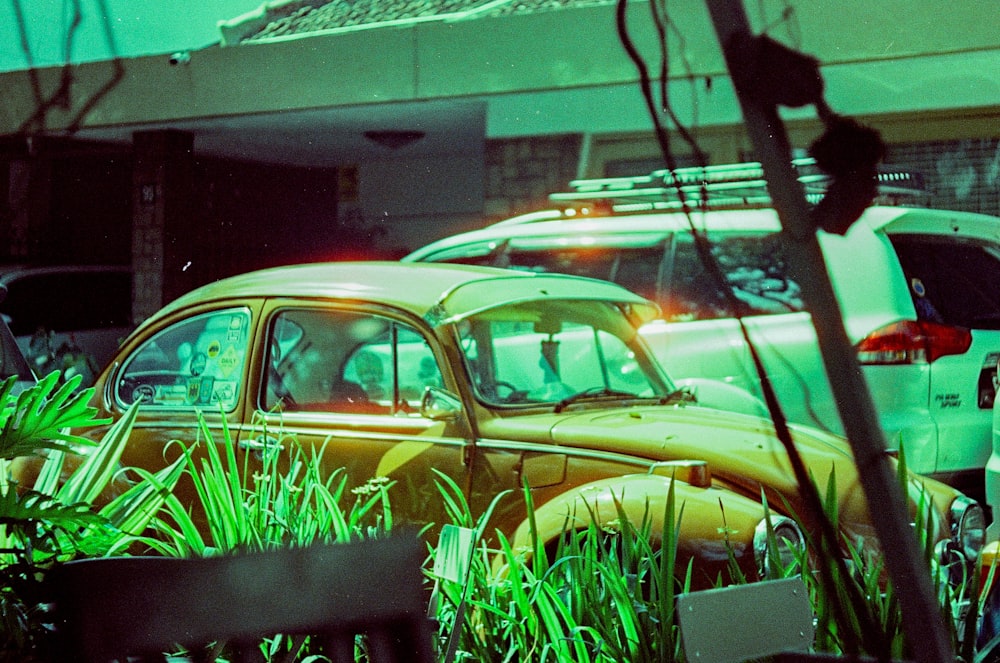 a yellow car parked in front of a building