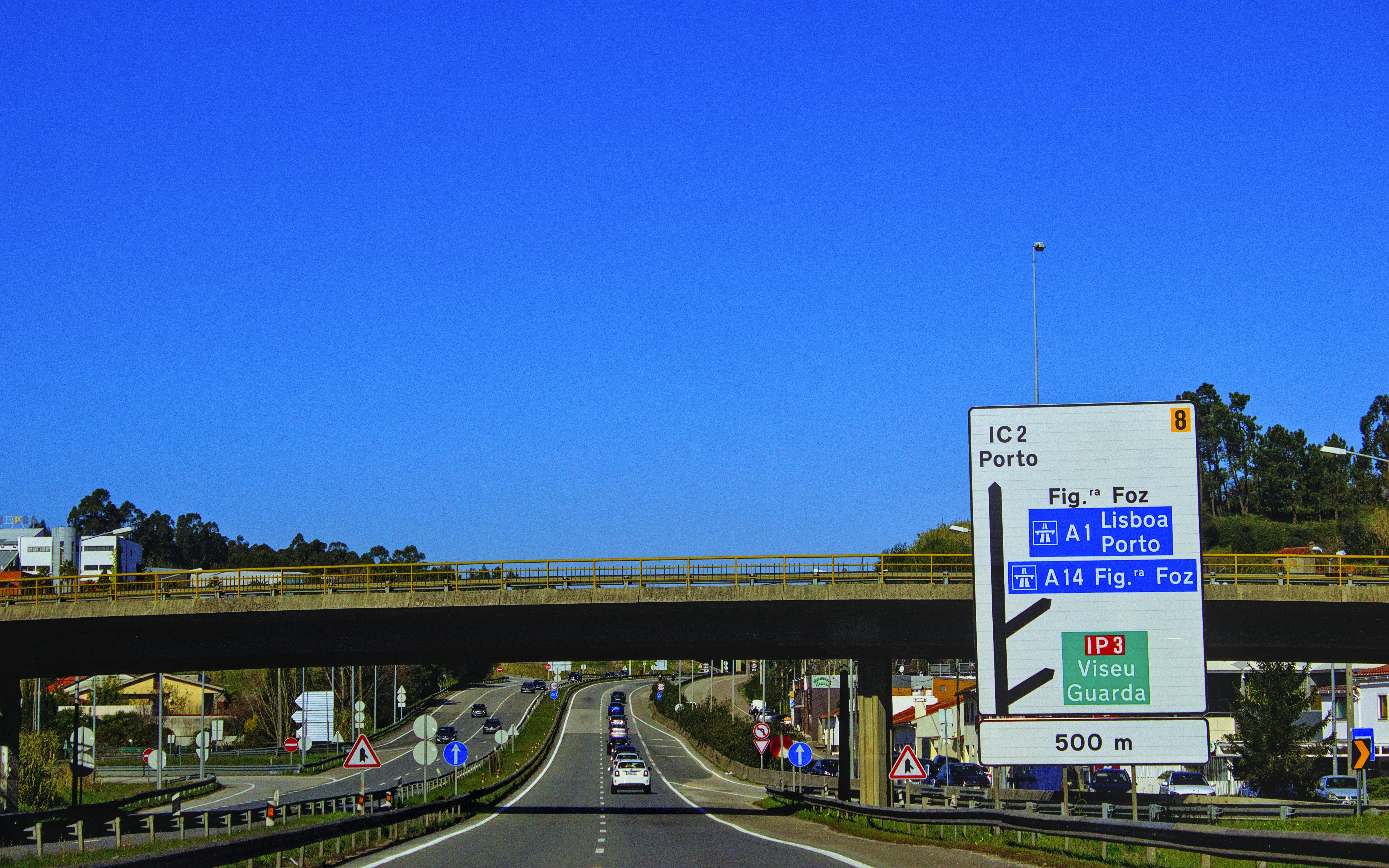 a highway sign on the side of a highway