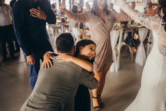 a couple of people that are dancing together