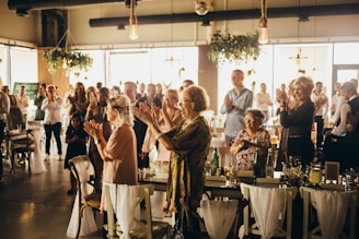 a group of people standing in a room