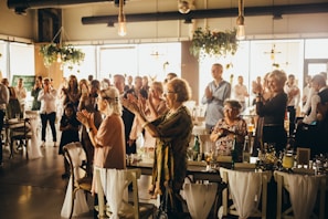 a group of people standing in a room