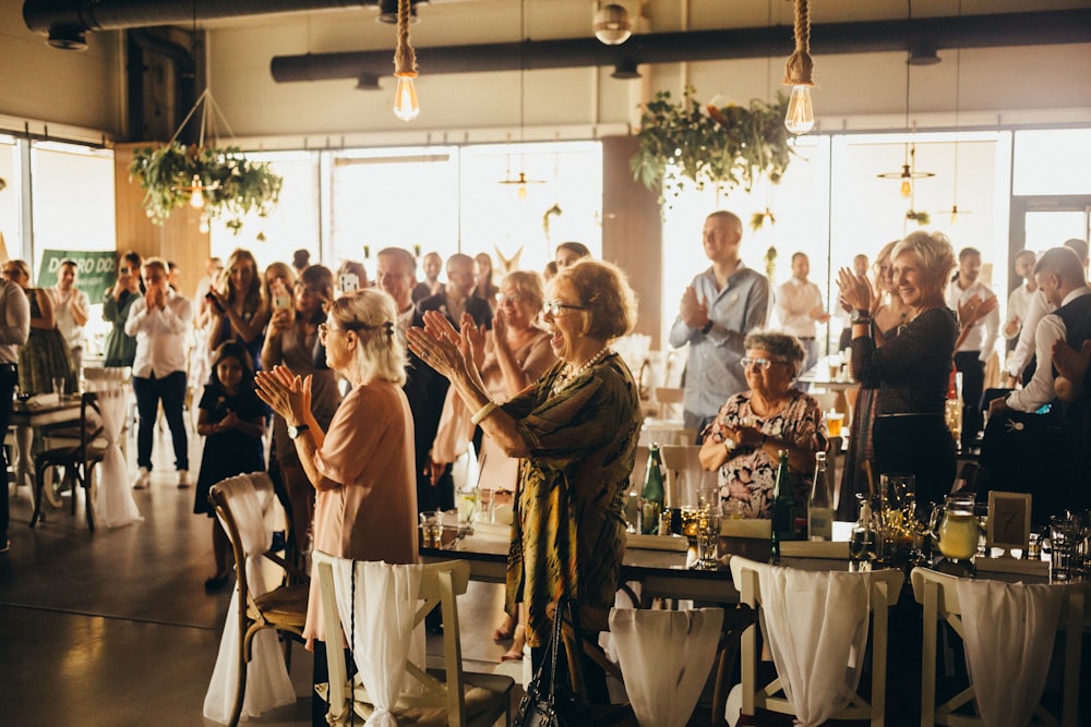 a group of people standing in a room