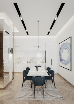 A modern kitchen extension with sleek lighting and fresh wall colors.