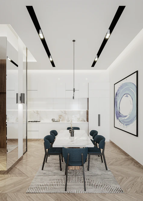 A bright, modern kitchen renovation with fresh blue and warm white accents reflecting tukangi's brand colors.