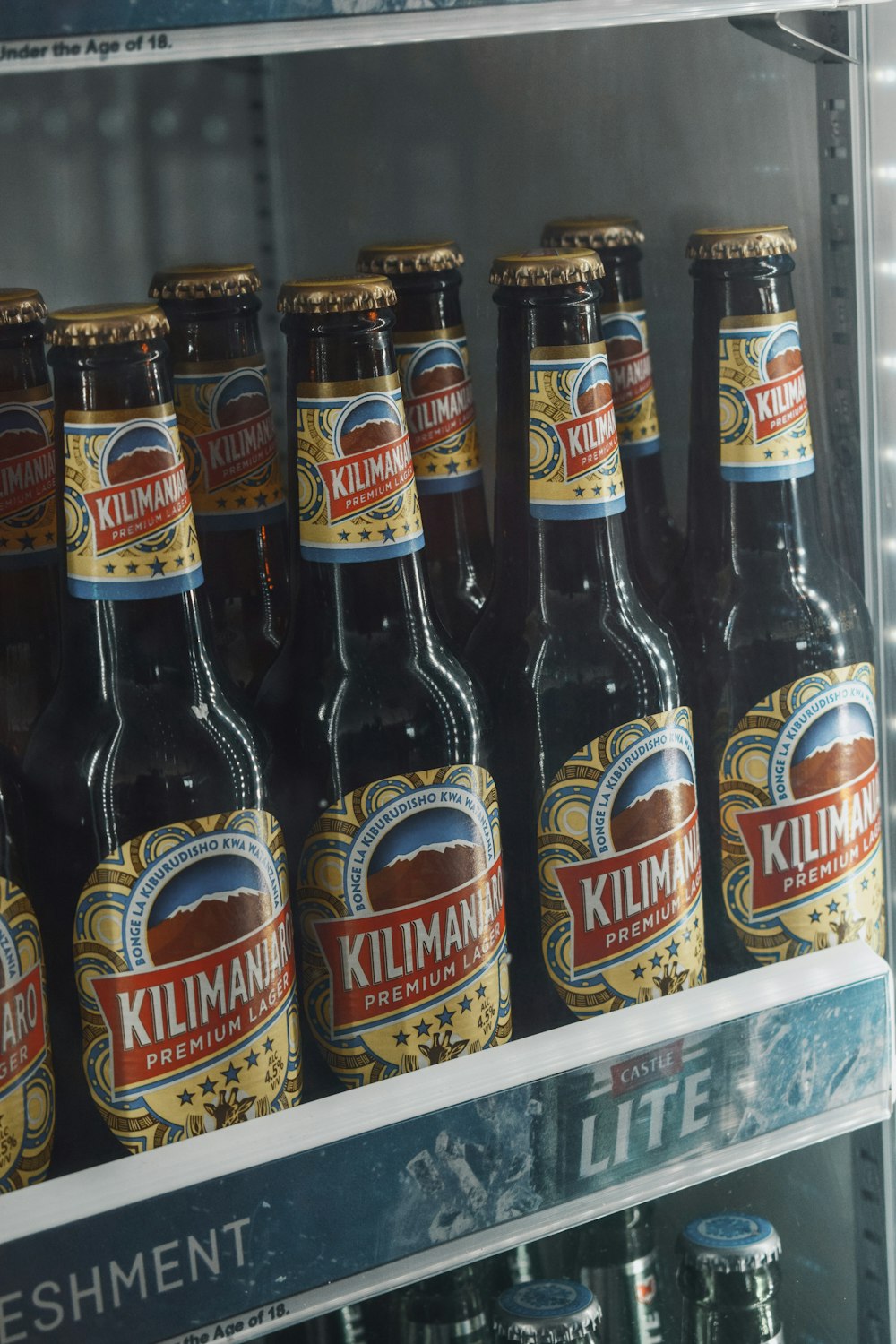 a display case filled with bottles of beer