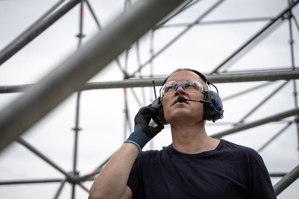 a man wearing safety goggles and a pair of ear muffs