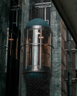 a tall building with a blue dome on top of it