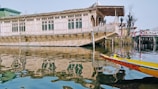 a boat floating on top of a body of water