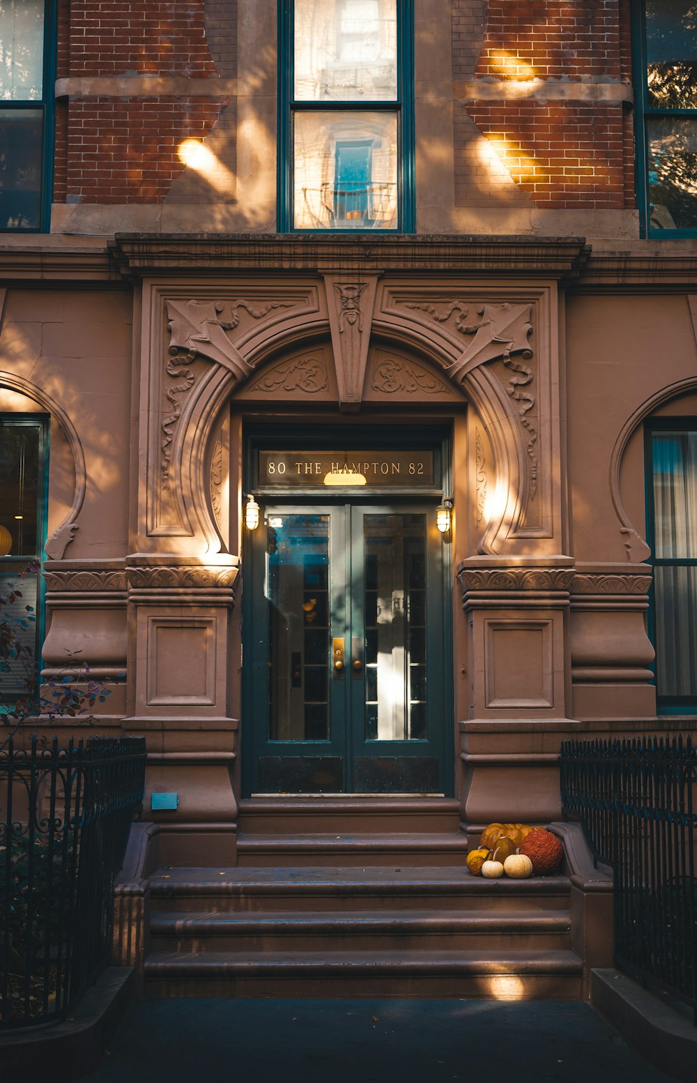 a building with a door and steps leading up to it