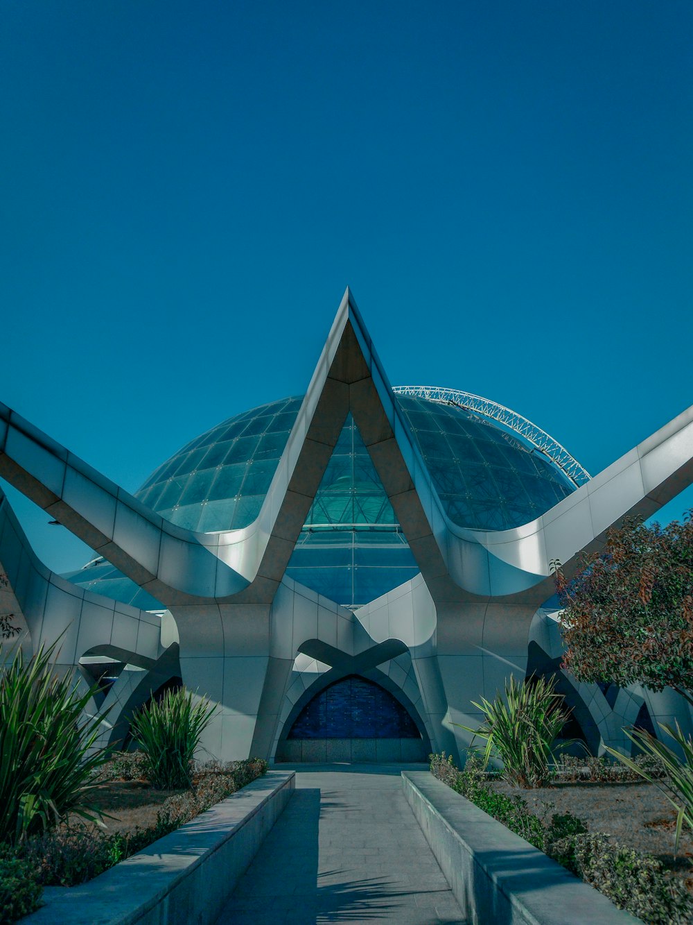 a large building with a large triangular roof