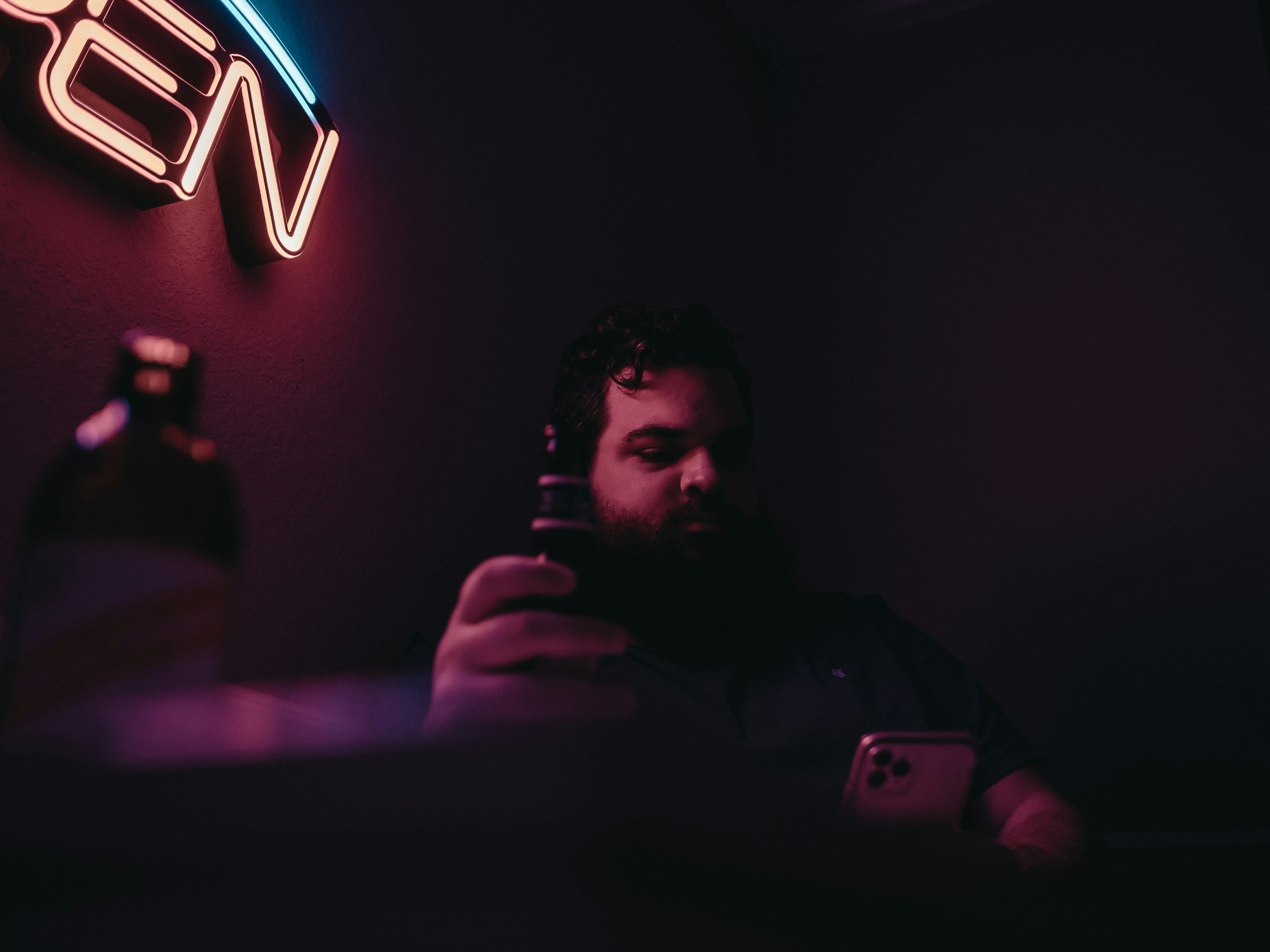 a man taking a picture of himself in a mirror