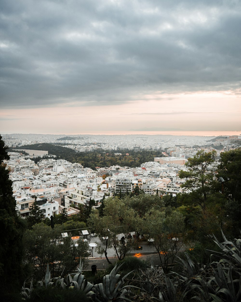 a view of a city from the top of a hill