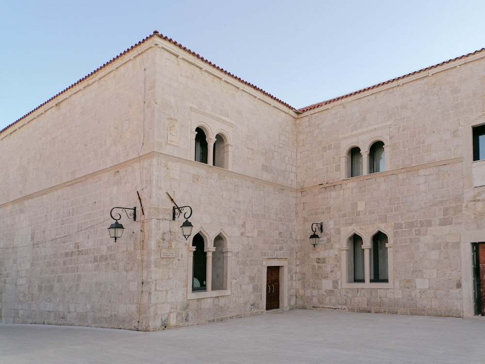 a large building with a clock on the front of it